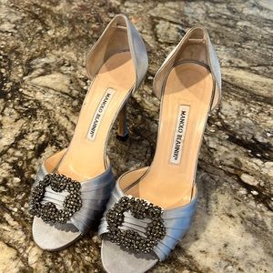 Baby blue Manolo Blahnik heels. Worn but very good condition. Sexy!